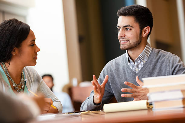 istock Diverse group of young adults collaborating in a professional setting. 2247174130