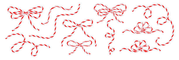 istock A set of Christmas bows and curls in the shape of Christmas candy canes. Vector design elements for decorating greeting banners, advertising flyers, and postcards 2247180921