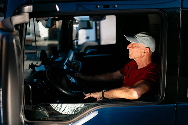 istock Senior man truck driver driving semitruck 2247182049