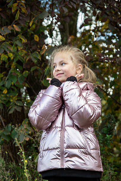 istock happy girl walks through the autumn forest 2247182361