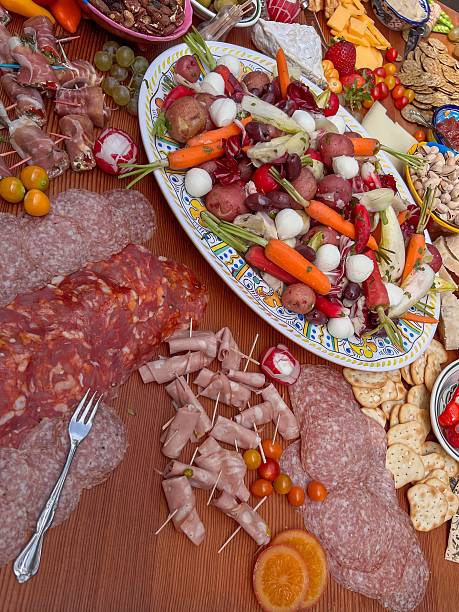 istock Italian-Themed Charcuterie Board with Meats, Cheese, and Vegetables 2247183180