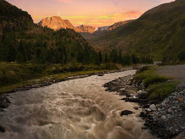 istock Brook in Kaunertal valley on a summer evening 2247183613