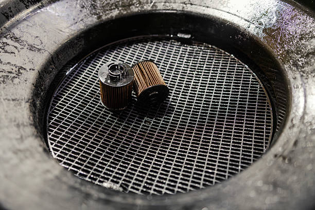 istock Replacing old engine oil filters during car service 2247184323