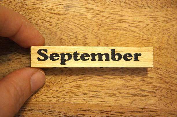 istock September text on wooden block with wooden background, Copy Space 2247188227