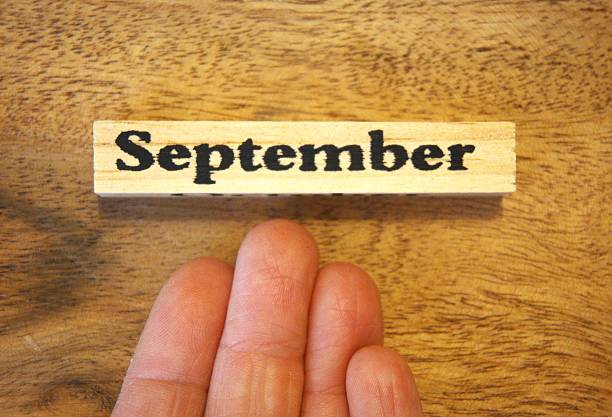 istock September text on wooden block with wooden background, Copy Space 2247188256