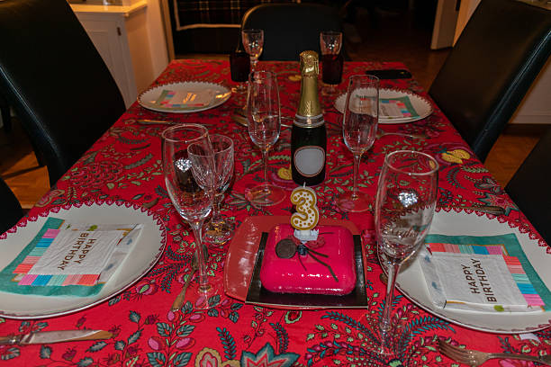 istock A birthday cake with number three on a table with decoration and drink 2247189331
