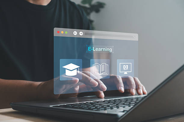 istock Modern e-learning concept. Man hands typing on a laptop with digital education icons, illustrating online courses, remote learning and virtual study tools for efficient digital knowledge access. 2247189934