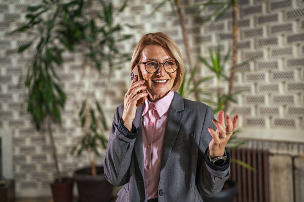 istock Senior businesswoman communicating on phone call in office 2247200119