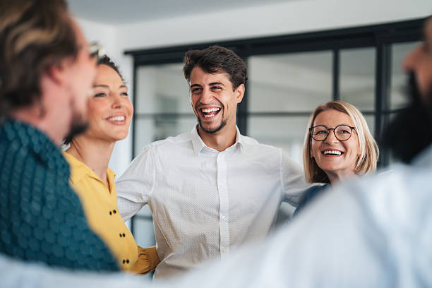 istock Business team embracing after achieving goals 2247200486