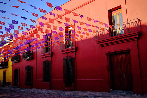 istock Red Facade with Papel Picado in Warm Light (Oaxaca de Juarez, Mexico) 2247200883