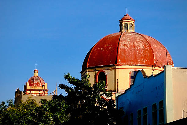 istock Twin Red Church Domes Against Blue Sky (Oaxaca de Juarez, Mexico) 2247200895