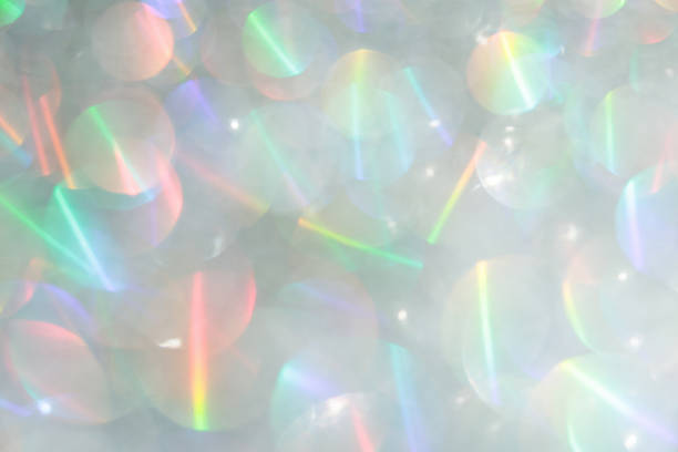 istock Shiny luxury glitter rainbow glow light flare with bokeh background 2247202762