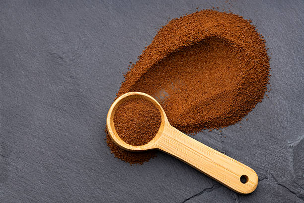 istock Organic dry coffee in a spoon - Coffea 2247203518
