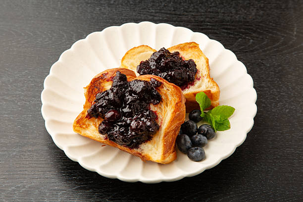 istock Bread topped with blueberry sauce 2247204700