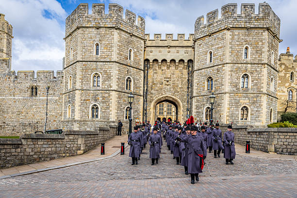 March 11, 2025, Windsor, UK: Royal guards are marching out of the gate of the Windsor Castle in Great Britain
