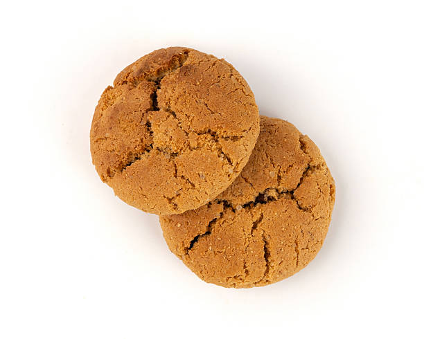 istock Chocolate cookies with chocolate filling isolated, brown round biscuits, broken sweet cocoa pastry 2247208930