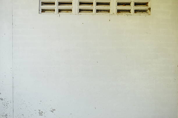 old wall with ventilation hole of home, exterior design construction industry
