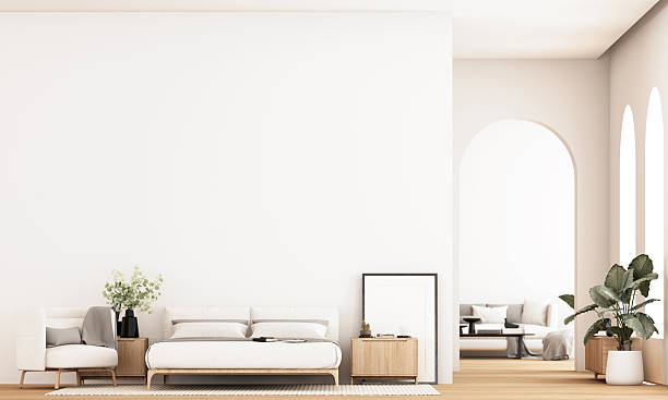 istock Minimal bedroom with soft wood tones, neutral bedding, and natural light highlighting clean architectural lines. 3d rendering. 2247216193