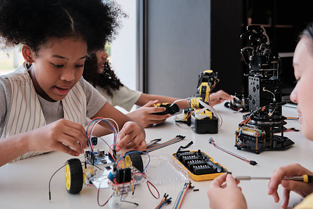 istock Black student girl robotic design in a science and engineering classroom. 2247221994