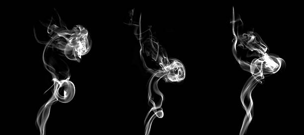 istock Abstract swirling white smoke shapes on a black background, creating a dynamic flowing texture ideal for branding, and creative visual effects that emphasize mystery, and minimalistic atmosphere. 2247224819
