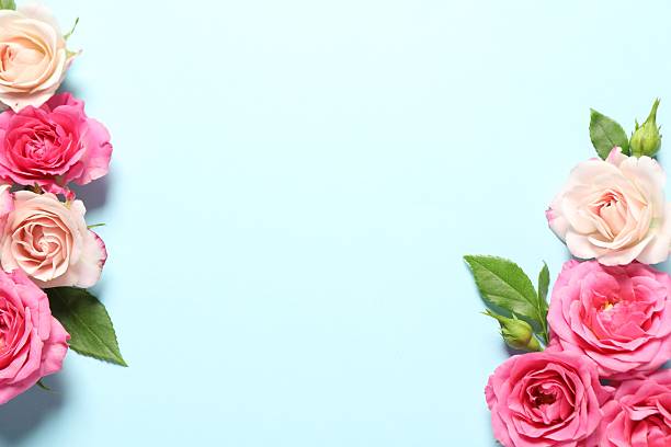 istock Happy Mother's Day. Beautiful roses on light blue background, flat lay. Space for text 2247231889
