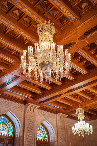 istock Crystal Chandeliers and Ornate Wooden Ceiling Inside Islamic Interior 2247232179
