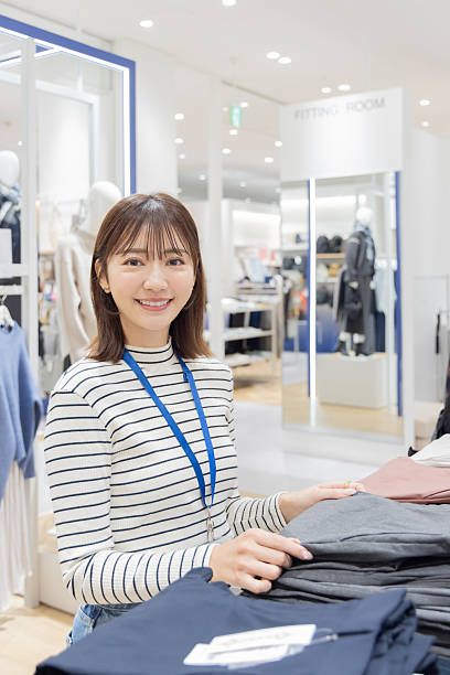 istock Asian woman working in a clothing store 2247232537