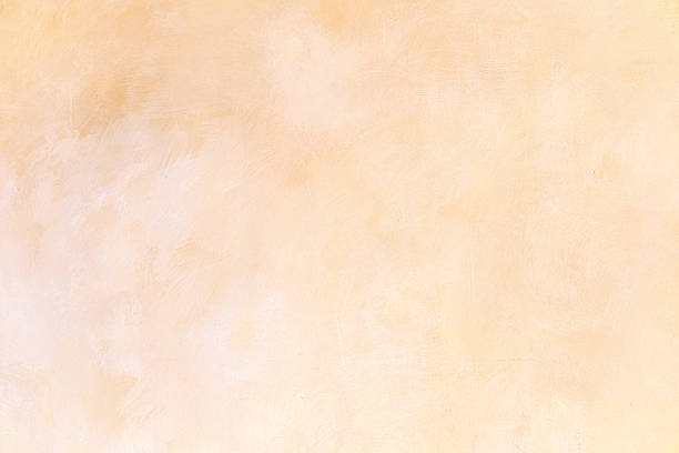 istock Soft textured backdrop with subtle warm light gradient gentle fading light beige to peach 2247233811