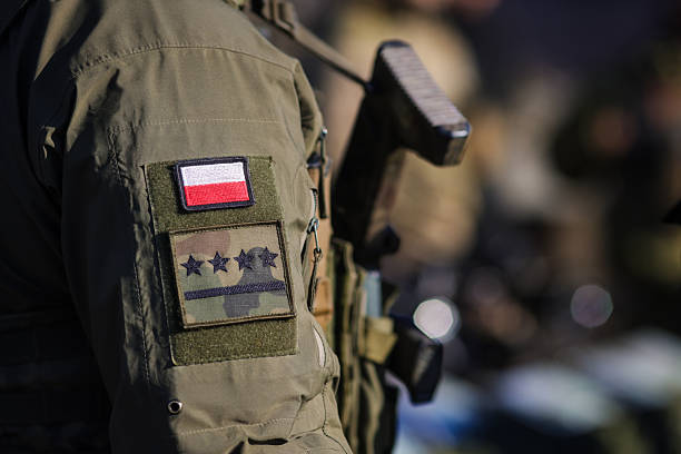 istock Details with the patch of a Polish soldier during a NATO Multinational Exercise. 2247234204