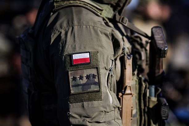 istock Details with the patch of a Polish soldier during a NATO Multinational Exercise. 2247234207