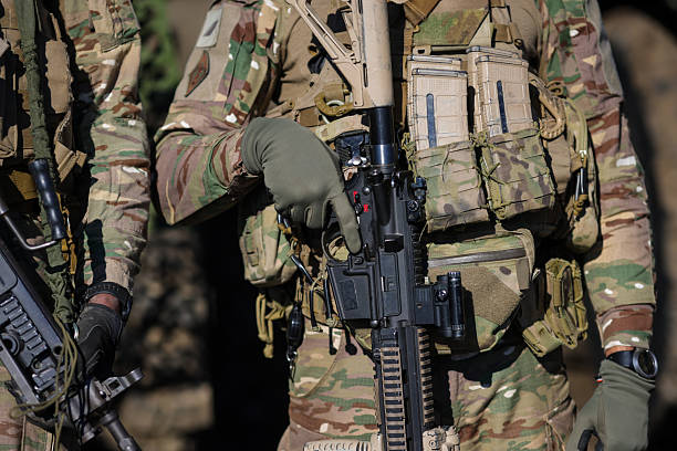istock French soldier in combat gear during a NATo Multinational Exercise. 2247234300