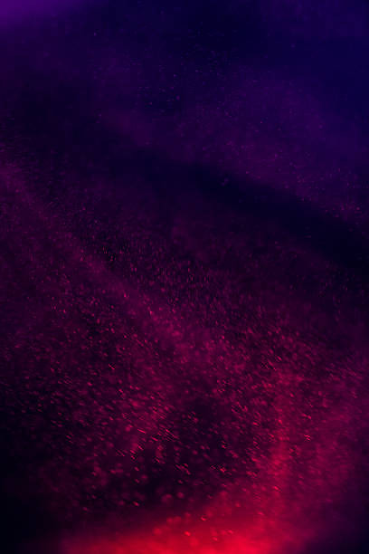 A rich, purple-hued abstract scene with swirling fog and speckled light; perfect for dramatic backdrops, digital art, and moody design projects conveying mystery, nightlife, or dreamlike atmosphere.
