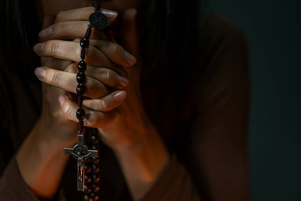 Hand holding a cross, Hope and pray concept
