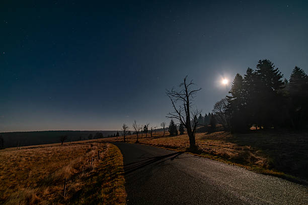 istock Autumn full moon night with clear sky in Krusne mountains 2247238872