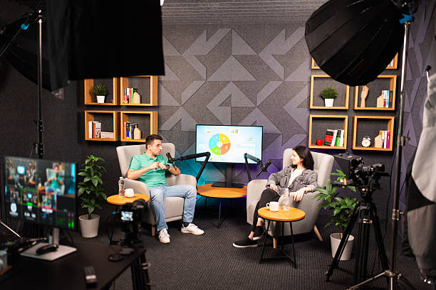 istock Man and woman in a podcast 2247240367