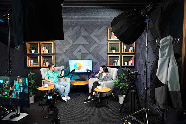 istock Man and woman in a podcast 2247240384