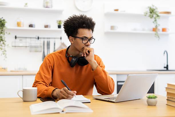 istock Man Working on Laptop at Home 2247241614
