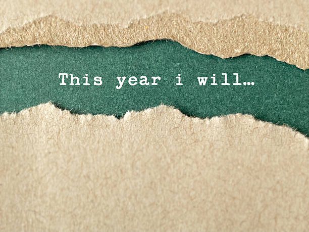 istock Motivational “This Year I Will…” Quote below Torn Paper 2247243747
