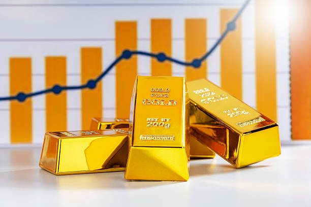 istock Stack of gold bars and an upward trend. 2247247801