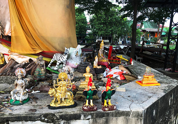 istock Colorful Offering Statues at Sacred Tree Shrine 2247248336