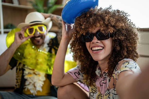 istock Happy couple enjoying staycation imagining beach summer vacation 2247249868