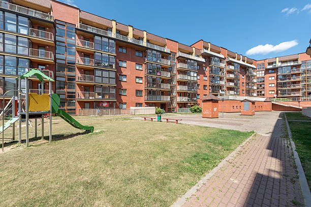 istock Modern Apartment Complex Courtyard with Play Area and Spacious Walkways 2247252057