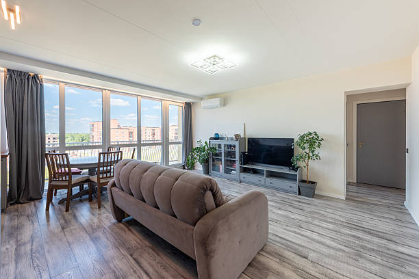 istock Modern Living Room With Large Window Offering Natural Light 2247252158