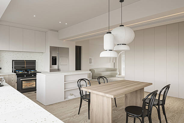 istock Modern Japandi Kitchen and Dining Interior with Light Wood Table, White Cabinets, and Oversized Lantern Pendants. 2247252207