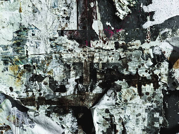 istock Old grunge ripped, torn vintage posters creased crumpled paper surface texture background 2247258773
