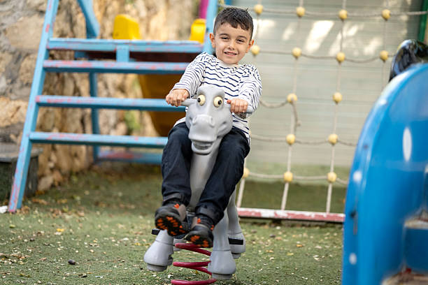 A child having fun alone in the playground