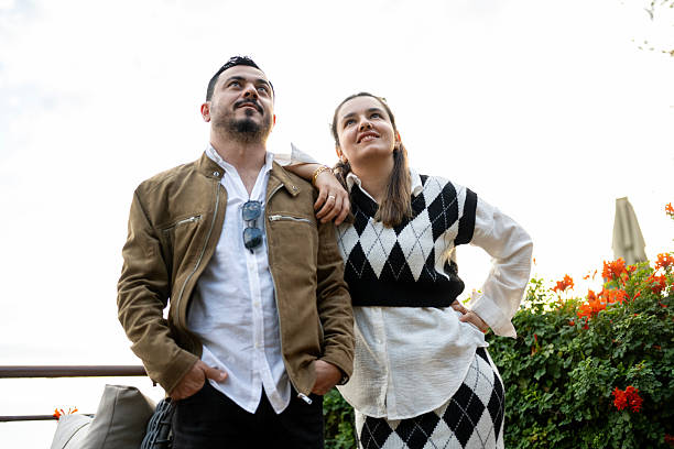 istock Happy couple spending emotional time on balcony 2247261957
