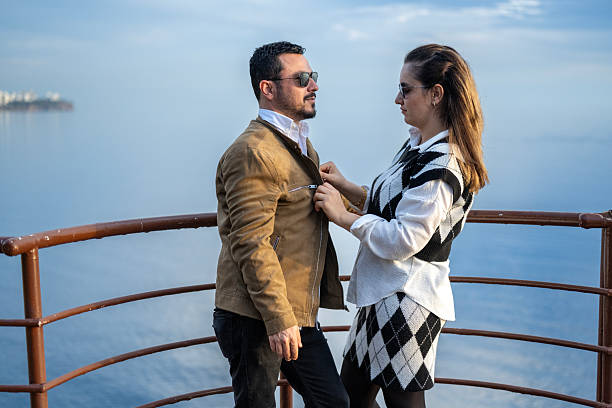 istock Happy couple spending emotional time on balcony 2247263923