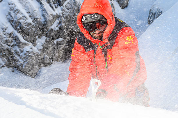 istock Determined Mountaineer Navigating Snowy High Mountains in High-altitude Gear 2247264118