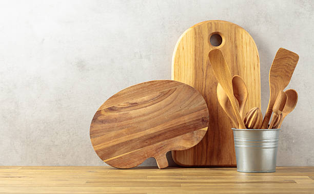 istock Wooden kitchen utensils on a wooden table. 2247265410